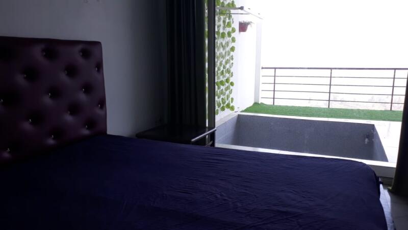 poolside view from bedroom in morni hills